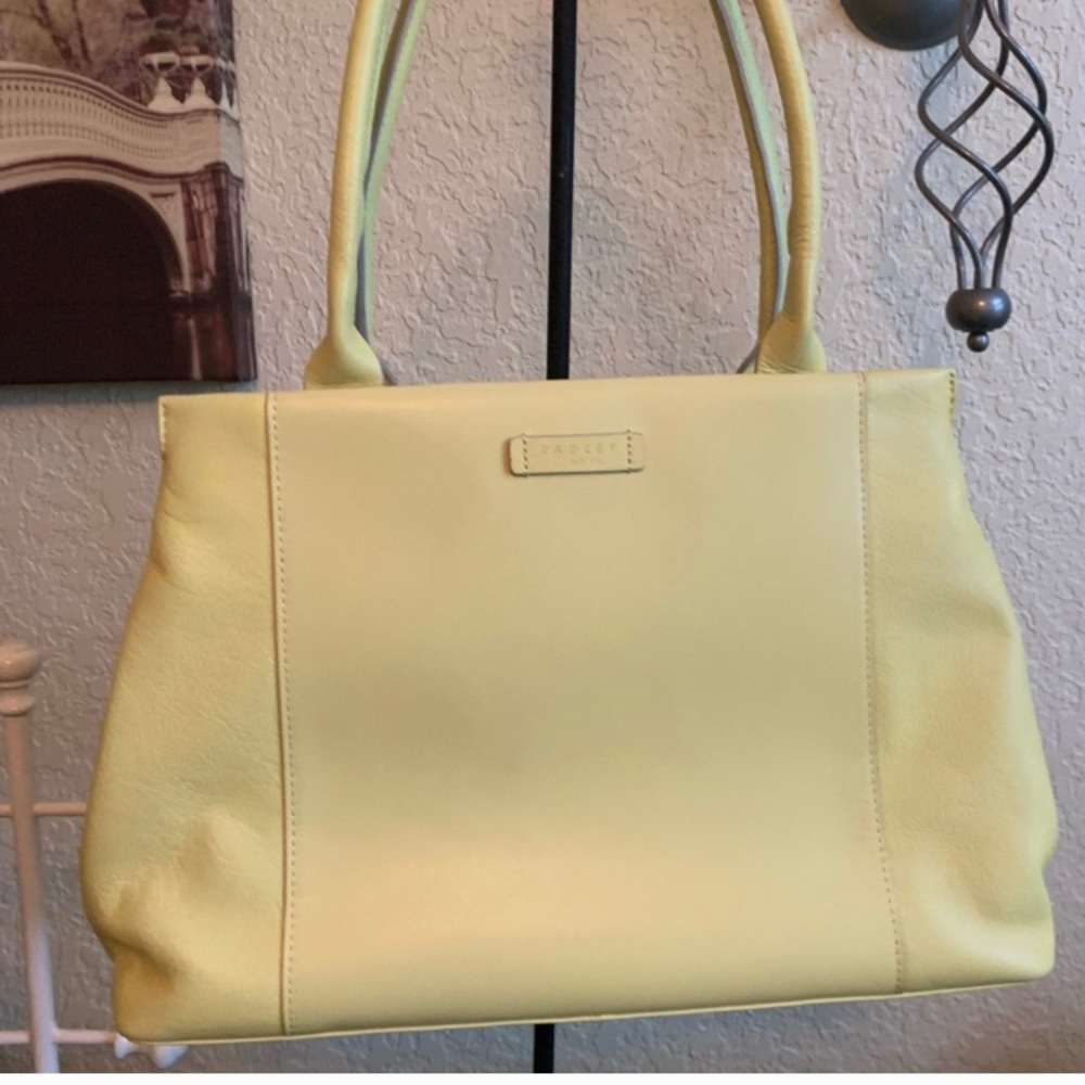 Radley London soft muted yellow leather tote.